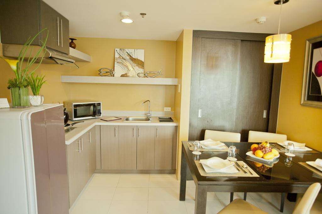 The Exchange Regency Residence Hotel Managed By Hii Pásig Habitación foto