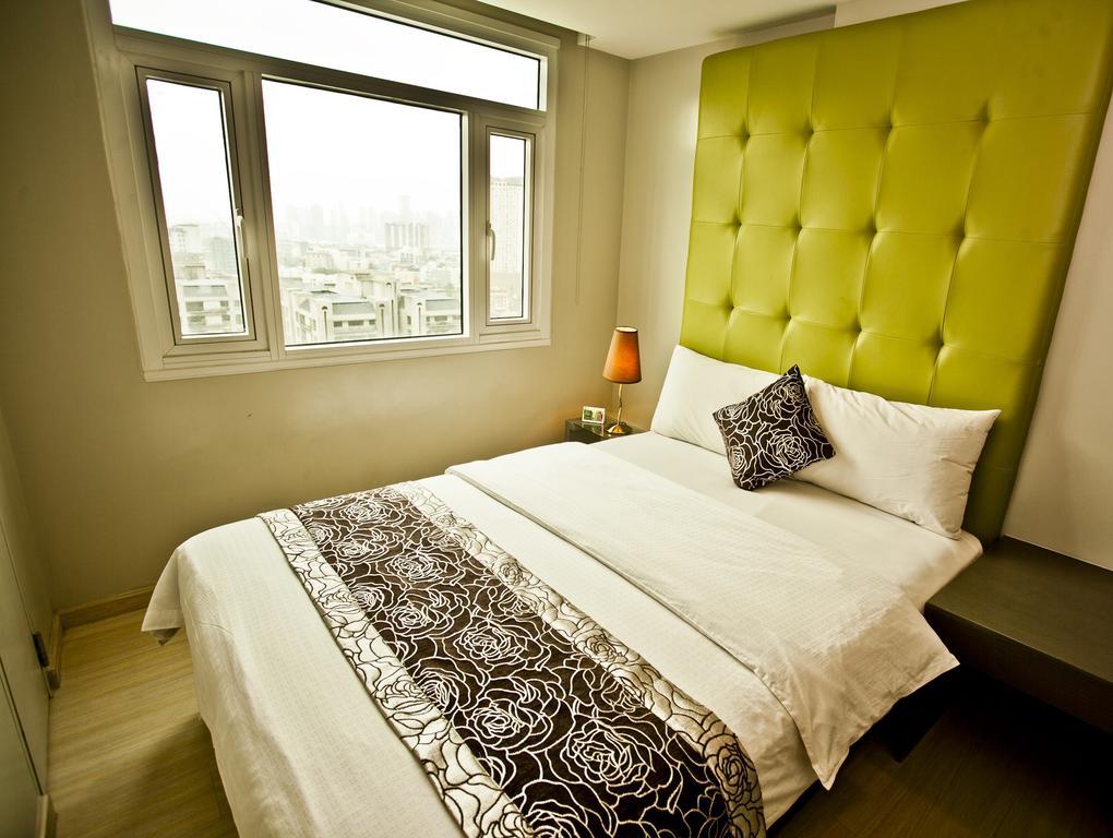 The Exchange Regency Residence Hotel Managed By Hii Pásig Habitación foto